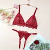 Camisola floral de encaje francés estilo europeo y americano conjunto de lencería sexy transparente hueco de tres piezas 7029S