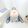 Mochila Infantil Nueva Bloque de Color Bolsa Escolar para Jardín de Infancia Niños y Niñas de Primaria Mochila Ligera Casual de Viaje Moderna