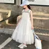 Vestido de Verão para Meninas 2026 Novo Estilo Roupas para Crianças Grandes Conjunto de Vestido de Verão Fino com Alça para Crianças