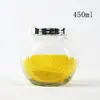 Nuevo Frasco de Vidrio Transparente Sellado de Múltiples Especificaciones Forma de Tambor Plano Botella de Miel de Grado Alimenticio Botella para Nido de Pájaro Mermelada Sub-Embotellado Al Por Mayor