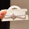 Pulseira com pingente de laço de zircônia estilo francês, toque de luxo leve e de alta qualidade, acessório feminino doce e versátil estilo coreano ins
