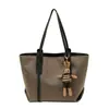 Bolsa Tote Retrô Simples Feminina 2026 Nova Grande Capacidade Outono Elegante Bolsa de Ombro Único Moda Bolsa de Ombro para o Dia a Dia