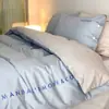 Estilo de Luxo Acessível Outono/Inverno 2025 Algodão de Fibra Longa 100S Algodão Puro Escovado Conjunto de Quatro Peças Lençóis de Algodão Puro Lençóis de Cama Ajustáveis Roupa de Cama