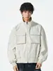 Chaqueta de moda de alta calle para primavera y otoño 2025 con cuello alto, corte holgado, diseño multibolsillos, resistente al viento, moderna