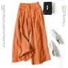 En stock al por mayorPantalones culotte anchos de algodón y lino para mujer con caída holgada, cintura alta semi-elástica, efecto adelgazante, largo de nueve puntos, para exportación