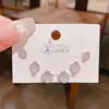 2025 Novo Conjunto de 3 Pares de Brincos Flor de Zircônia Curva para Mulheres Estilo Coreano Agulha de Prata Conjunto de 6 Peças de Brincos de Alta Qualidade