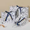 Sacolas de presente transfronteiriças com estampas florais e fitas, sacolas de embalagem de alta qualidade, sacolas de presente para feriados, bolsas de mão, sacolas de embalagem para roupas