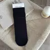 Meias Lisas Simples para Mulheres Início do Outono Confortáveis Estilo Preguiçoso Meias Pós-Parto Meias Cinzas de Cano Médio Simples Versáteis Meias Largas de Algodão