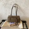 Bolsa de Bowling Fosca de Grande Capacidade Feminina 2026 Nova Moda Retro Bolsa de Ombro Único Versátil Bolsa Tote para Trabalho e Deslocamento