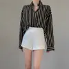 Traje de temperamento versátil con shorts para mujer 2026 Primavera Verano nuevo pantalones de pierna ancha de cintura alta línea A adelgazantes ropa exterior pantalones casuales