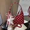 Bolso de lunares transfronterizo para mujer, nuevo modelo 2026 tipo bolsa de albóndiga, bolso de mano, bolso de hombro y cruzado de alta gama para el verano