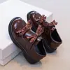 Zapatos de piel pequeños con patrón de rejilla y tira de encaje con decoración de doble nudo de mariposa, estilo princesa para niñas, modernos, versátiles, nuevos para Primavera/Otoño 2026