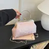Bolso de noche cheongsam estilo chino nuevo 2026, accesorios retro de perlas artificiales, bolso de hombro, bolso cruzado, bolso estilo chino en tono dorado