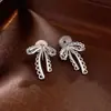 Pinzas para Orejas de Encaje con Forma de Lazo Estilo Coreano Personalizadas para Bobina de Mosquito para Mujeres Sin Perforaciones, Pendientes de Nicho con un Toque de Lujo Ligero y de Alta Gama
