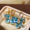 Pendientes Redondos Plegados con Borlas Tachonados de Pedrería Estilo Retro Europeo y Americano, de Moda y Versátiles, con un Toque de Lujo Ligero y de Alta Gama
