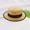 Sombrero de paja plano de moda europeo y americano nuevo, simple, sombrero de paja de moda para redes sociales, sombrero de playa vintage británico fábrica