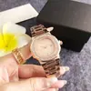 Reloj con logo personalizado, reloj de mujer en forma de barril con diamantes, esfera azul, diseño de nicho de alta gama, cuarzo impermeable