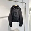Parka corta con capucha de plumón de estilo casual para mujer, nuevo abrigo versátil y engrosado para el invierno 2026