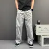 Pantalones casuales de estilo nuevo para primavera-verano retro japonés con logo pequeño, cintura elástica con cordón, pierna ancha fluida, corte holgado, modernos y versátiles, color liso