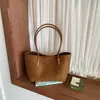 Bolso de hombro de moda texturizado retro minimalista, bolso casual de diseño de nicho para mujer, nuevo bolso de axila otoño e invierno 2026