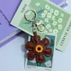 Huayang Creativo Cuero Girasol Colgante Accesorios para Bolsas Llavero PU Decoración de Bolso Girasol Accesorios al por Mayor