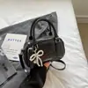 Bolso Satchel de Bolos de Moda para Mujer 2025 Verano Nuevo Estilo Coreano Bolso de Hombro Sencillo Bolso Cruzado de Diseño de Nicho para Mujer