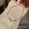 Collar romántico de flor de concha natural y perlas estilo francés para mujer, sensación de lujo ligero de nicho de alta gama, cadena de clavícula simple y versátil