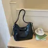 Mochila tipo tote retro de gran capacidad estilo coreano transfronteriza para mujer, nuevo modelo 2026, simple y de nicho, bolso de mano y bolso cruzado para el día a día