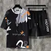 Nuevo Conjunto de Dos Piezas para Hombre de Verano Camiseta de Manga Corta y Shorts tipo Traje Camuflaje Tendencia Hombre Guapo Casual Transpirable Deportivo
