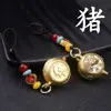 Cuerda carácter Fu metal manija giratoria olla llavero zodiaco girar Hu zodiaco estilo nacional llavero