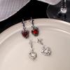 Pendientes de circonita de amor de lava de temperamento simple cuatro estrellas Mans corazón de melocotón líquido oscuro dulce fresco pendientes irregulares