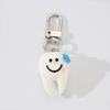 Novo desenho animado fofo dente chaveiro resina sorriso sempre aberto rosto sorridente dentes personalizado moda bolsa pingente