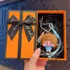 Llavero de Chica de Cabello Largo y Ondulado Creativo de Dibujos Animados Lindo Exquisito Adorno para Correa de Teléfono Colgante de Bolso Pequeño Regalo