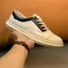 Suministro directo de fábrica estación europea zapatos de hombre color cuero combinación tendencia zapatos de tabla hombre versión coreana del Joker zapatos casuales una generación de cabello