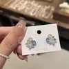 Pendientes de Estrella Transparentes de Cristal de Colores al por Mayor de Gama Alta Dulces y Lindos Temperamento Moda Versátiles con Incrustaciones de Diamantes para Mujer
