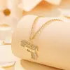 2026 Nuevo Collar Punk Transfronterizo Estilo Hip-Hop Máquina de Guerra con Colgante de Pistola Completo de Diamantes de Alta Gama para Mujeres Venta al por Mayor