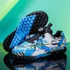 Nuevos zapatos de césped para fútbol escolar con hebilla giratoria al por mayor para niños, zapatos de entrenamiento de fútbol morados