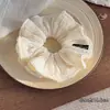 Goma de pelo de encaje plisado tejida, simple y elegante, versátil para el uso diario, liga para coleta, accesorio para el cabello de alta gama para mujer