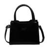 2026 Estilo francés fresco y elegante lazo verano nuevo gran capacidad color sólido moda hombro bandolera bolso para mujer