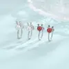 Selección artística: pendientes navideños con diseño en forma de U, con circonitas y asta de ciervo, con dulce perla francesa y cierre de clip.