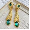 Pendientes largos vintage "El Cetro de la Reina" con gemas doradas lisas y baño de oro auténtico, línea flotante en plata 925.