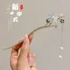 Horquilla de flor con borla para niñas, nuevo estilo chino, horquilla de estilo antiguo de nicho de alta gama, accesorio para el cabello para Hanfu y cheongsam