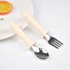 Nuevo Producto Transfronterizo Bebé Silicona Grado Alimenticio Acero Inoxidable 316 Entrenamiento Comida Tenedor Cuchara Juego de Vajilla Tenedor Cuchara