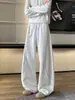Calça Casual Reta Solta Desconstruída com Corte Curvo Outono Nova Sweatpants High Street para Homens com Costura Visível Tendência 2026 Estilo Americano Color Block