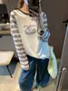 Además, la nueva camiseta casual de otoño con cuello redondo, rayas de colores contrastantes y mangas raglán MQ1782