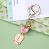 Paz y Alegría Gato de la Fortuna de Cerámica Colgante de Campana Estilo Japonés de Dibujos Animados Colgante de Perla Llavero de Cerámica Adorno para Bolso