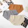 Ropa interior sin costuras de seda helada de cintura media con borde ondulado de color liso, ropa interior de una pieza ajustada para niñas y mujeres