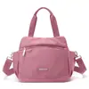 El nuevo bolso cruzado grande de nailon ligero con múltiples compartimentos de Colorful Fox es una bolsa de viaje