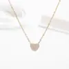 Collar con Anillo de Corazón Full Diamante de Acero de Titanio para Mujer Lujo Ligero Sentido de Diseño de Nicho Cadena para Clavícula Amor de Ángel Colgante Elegante para Mujer