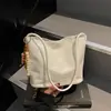 Bolso Cubo Retro de Gama Alta de Nicho para Mujer 2026 Nuevo de Moda Coreana Versátil Bolso de Hombro Bolso de Axila para Mujer